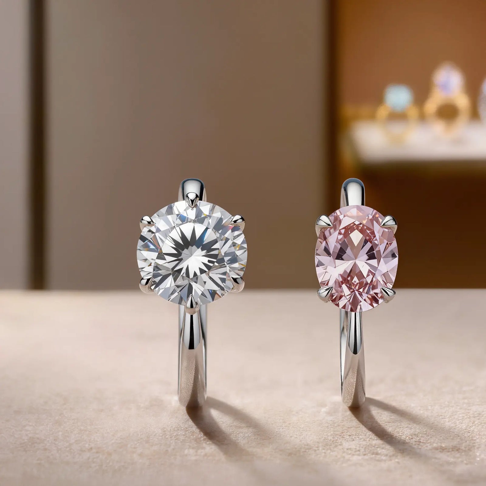 Two diamond alternatives featured in image_d73193.jpg: a classic round moissanite solitaire ring with intense light performance and an elegant oval peach-pink morganite ring.