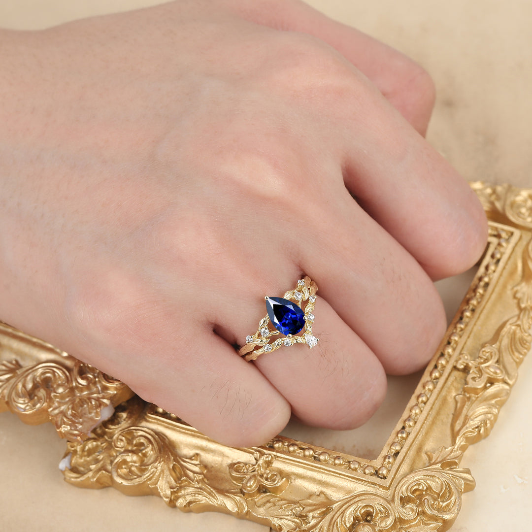 Bague de fiançailles en saphir bleu flamboyant avec vigne, ensemble romantique de mariage