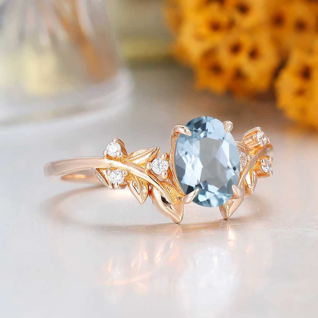 Zierlicher 1,5-Karäter Ovaler Aquamarin-Ring mit Blattmotiv, Moissanit-Einlage, Verlobungsring