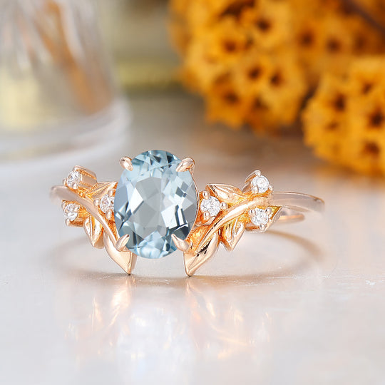 Zierlicher 1,5-Karäter Ovaler Aquamarin-Ring mit Blattmotiv, Moissanit-Einlage, Verlobungsring