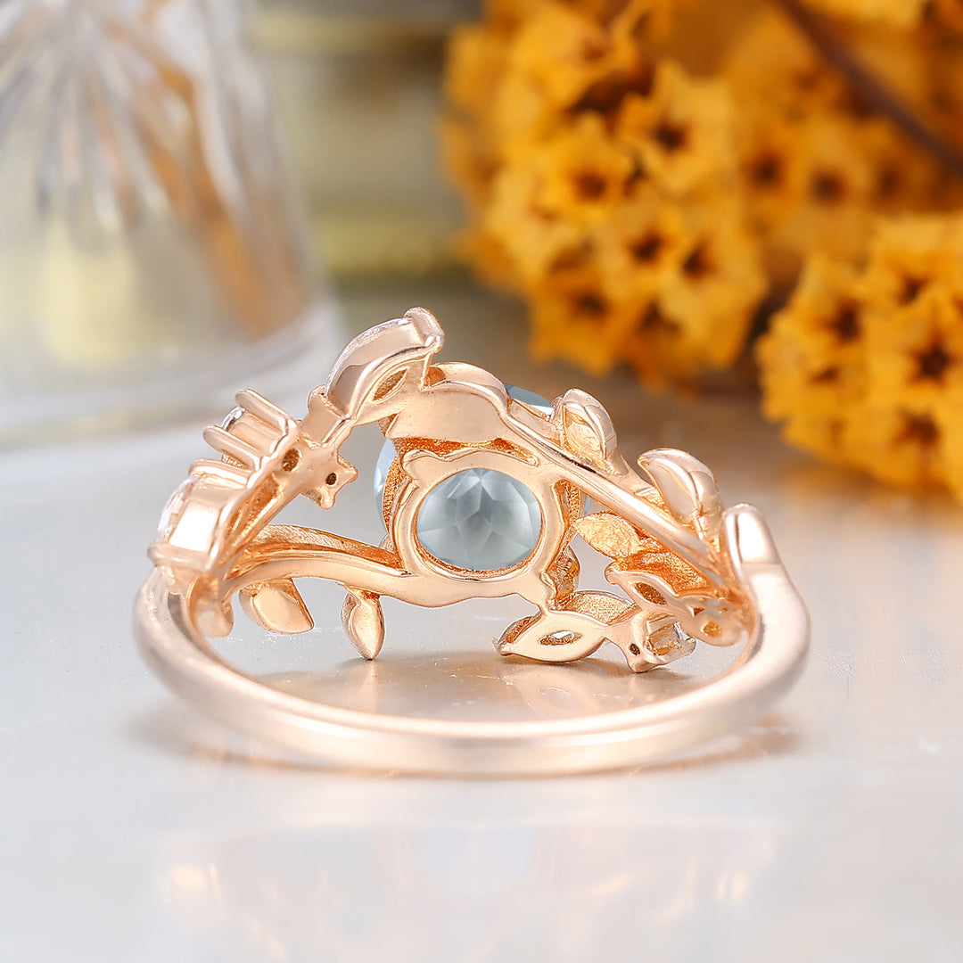 Antiker rund geformter Aquamarin Art Deco natürlicher Blatt-Reben-Ring