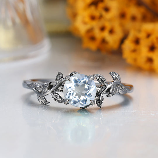 Solitaire ronde aquamarijn verlovingsring blad geïnspireerde trouwring voor dames