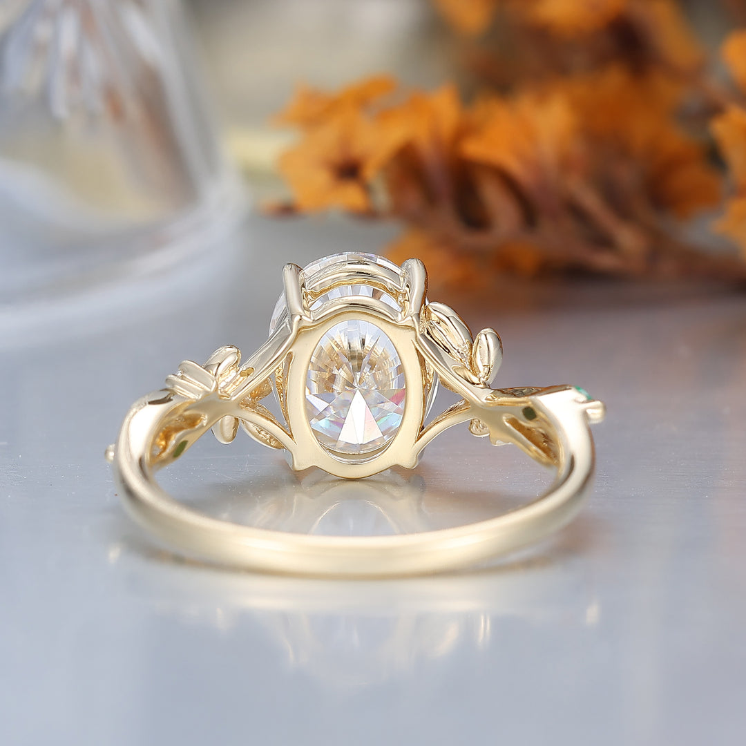 Anillo de compromiso con giro en forma de hoja y corte ovalado único de 2ct de moissanita