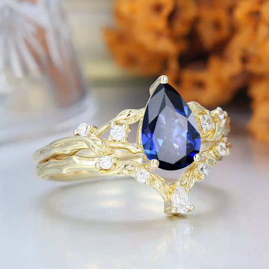 Bague de fiançailles en saphir bleu flamboyant avec vigne, ensemble romantique de mariage