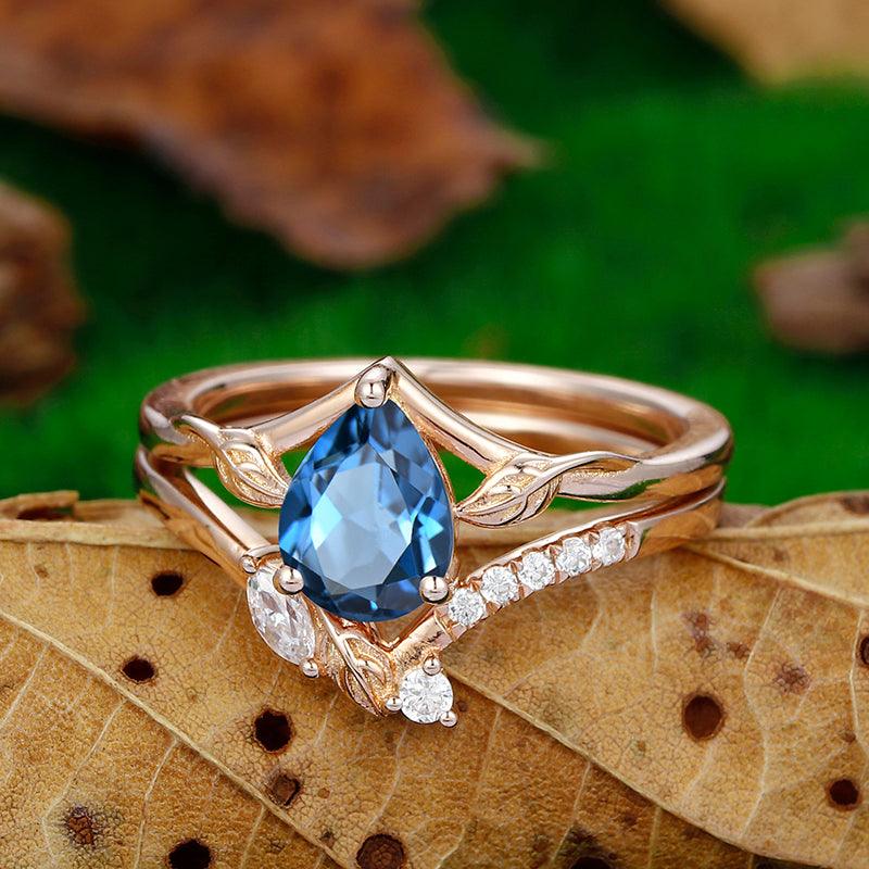 1.3CT Pear Shape London blue topaz natural leaf design Bridal ring set - Esdomera