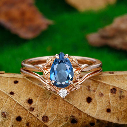 1.5 CT Pear Shape art deco leaf cluster London Blue Topaz Engagement ring set - Esdomera