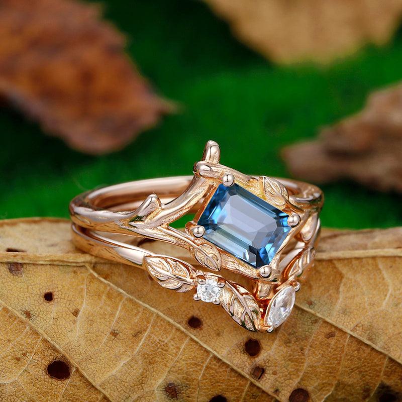 1 CT Emerald cut Split Shank London blue topaz ring set - Esdomera