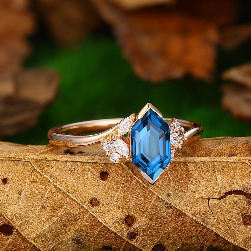 1.1 CT 10k gold Long hexagon Cut  twisted leaf  London blue topaz  engagement ring