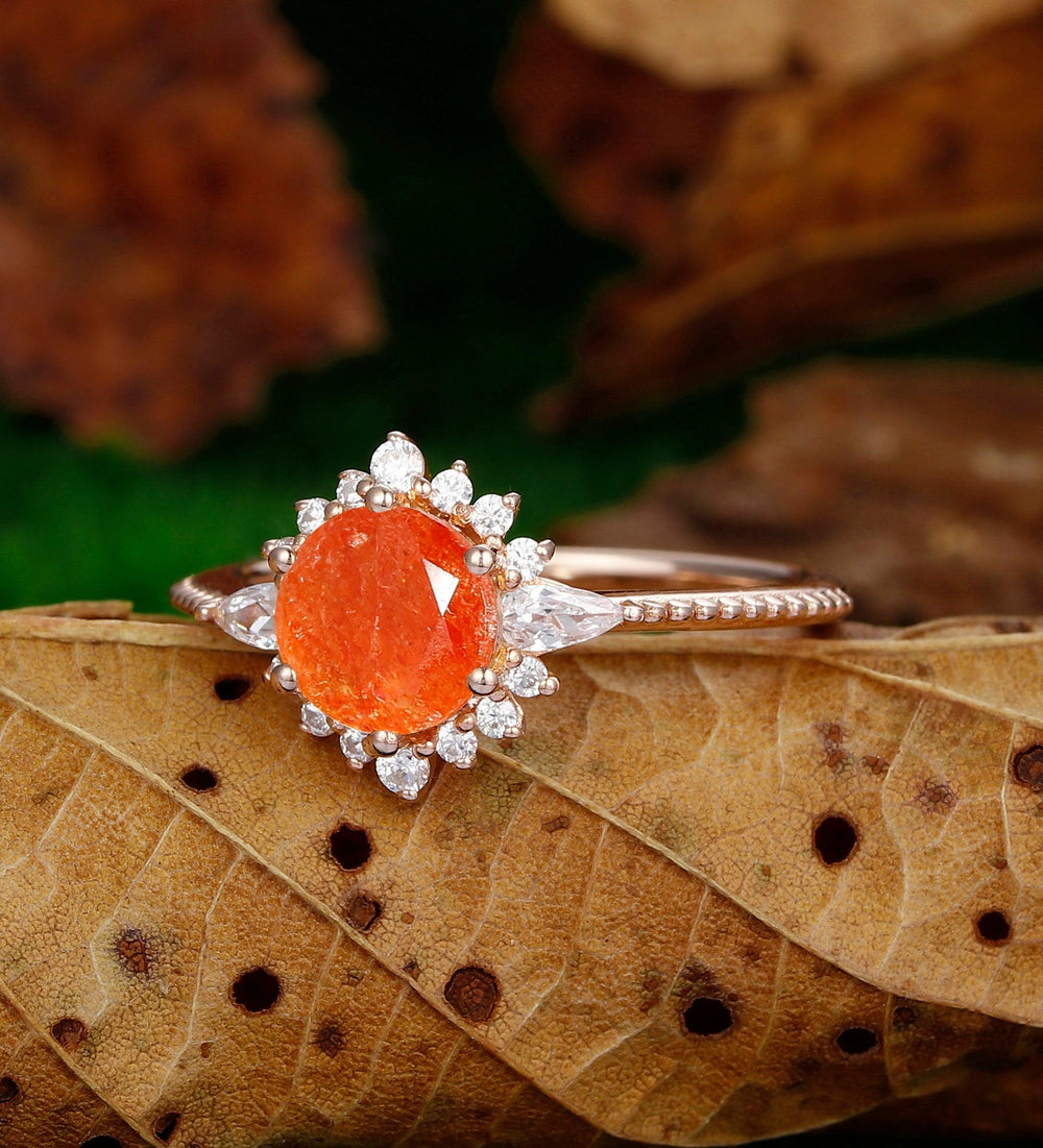 dainty 1.25ct round cut orange sunstone nature inspired sunstone rose gold sunburst halo Ring - Esdomera