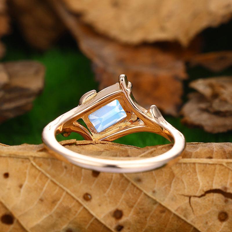 Solitaire Emerald Cut Bezel Set Moonstone Gold Split Shank Leaf Design Ring - Esdomera