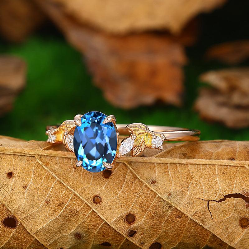 Unique leaf Curved Oval shape London blue topaz Cluster ring – Esdomera